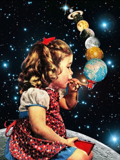 art girl blowing bubbles planets