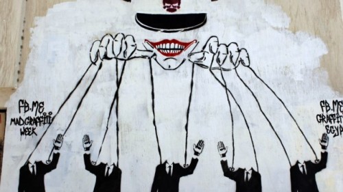 art-street-graffiti-puppet-corporate-control